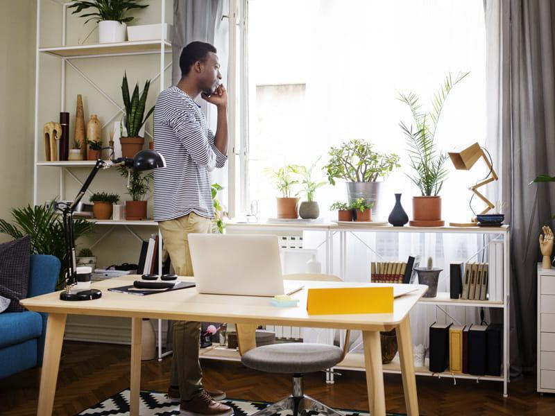 man working from home on phone
